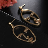 Hollow Out Face Dangle Earrings