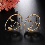 Hollow Out Face Dangle Earrings