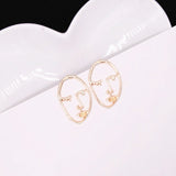 Hollow Out Face Dangle Earrings