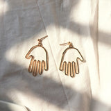 Hollow Out Face Dangle Earrings
