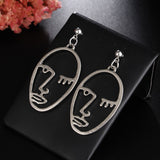 Hollow Out Face Dangle Earrings